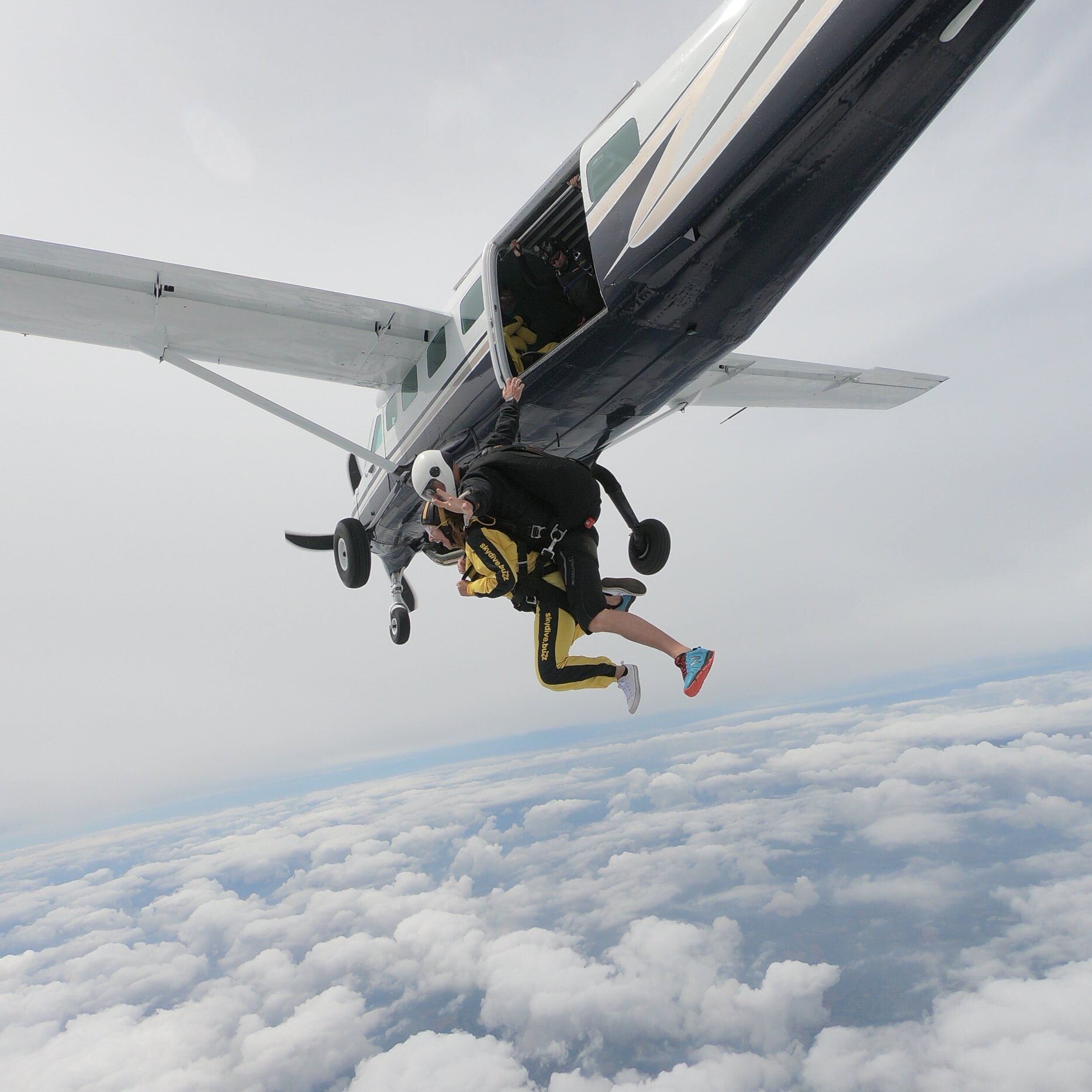 Skydivers jumping from an aeroplane