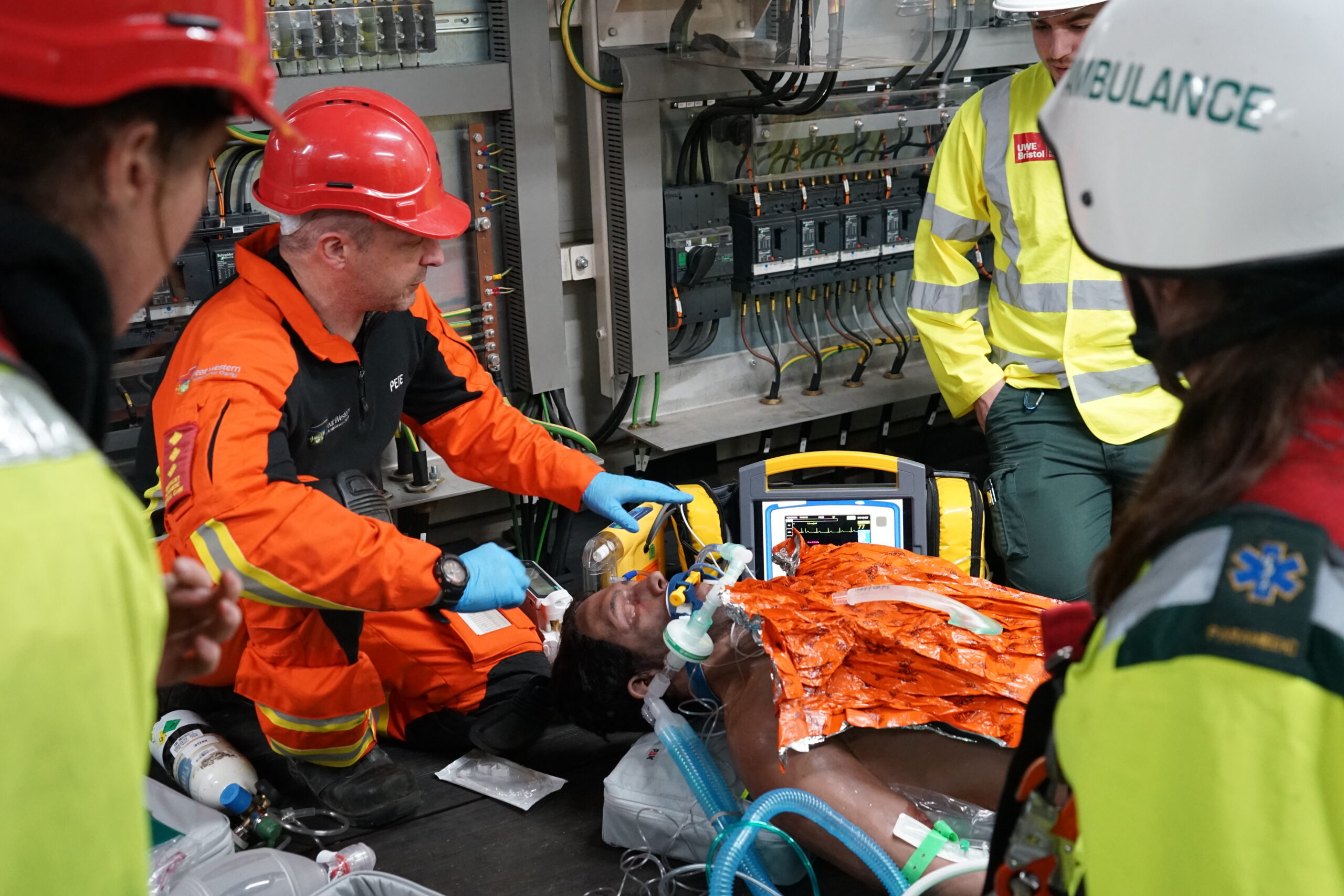 A patient is attended to and prepared for extrication.