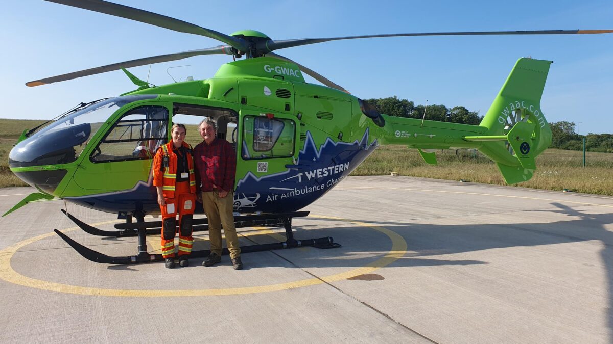 Mark Horton and Doctor Celestine by the GWAAC helicopter