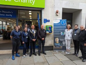 GWAAC staff, the Sheriff of Gloucester and Louise Polledri at an event celebrating the unvehling of the Polledri Foundation's 13th public access defib