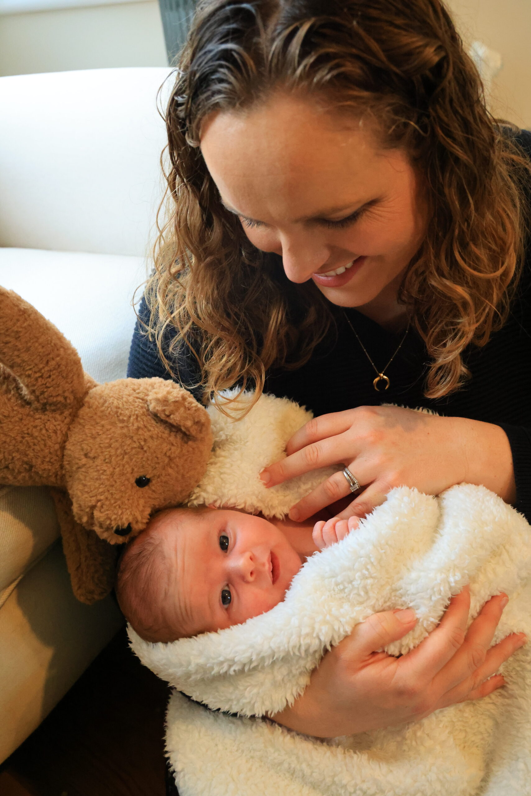 Mum Victoria with tiny Albie wrapped in a blanket