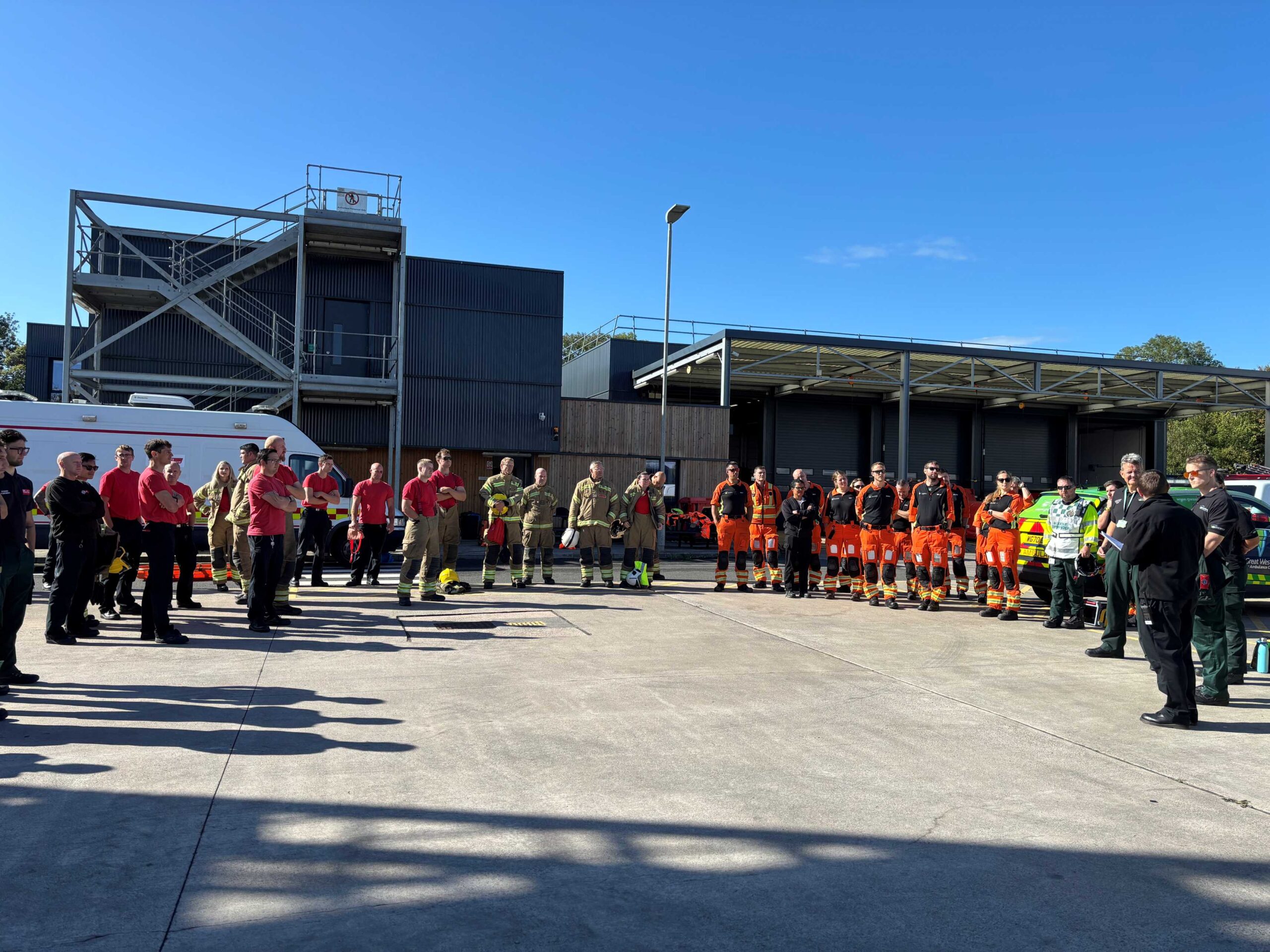 Crew from Great Western Air Ambulance Charity, UWE and Avon Fire and Rescue Service gather for a briefing