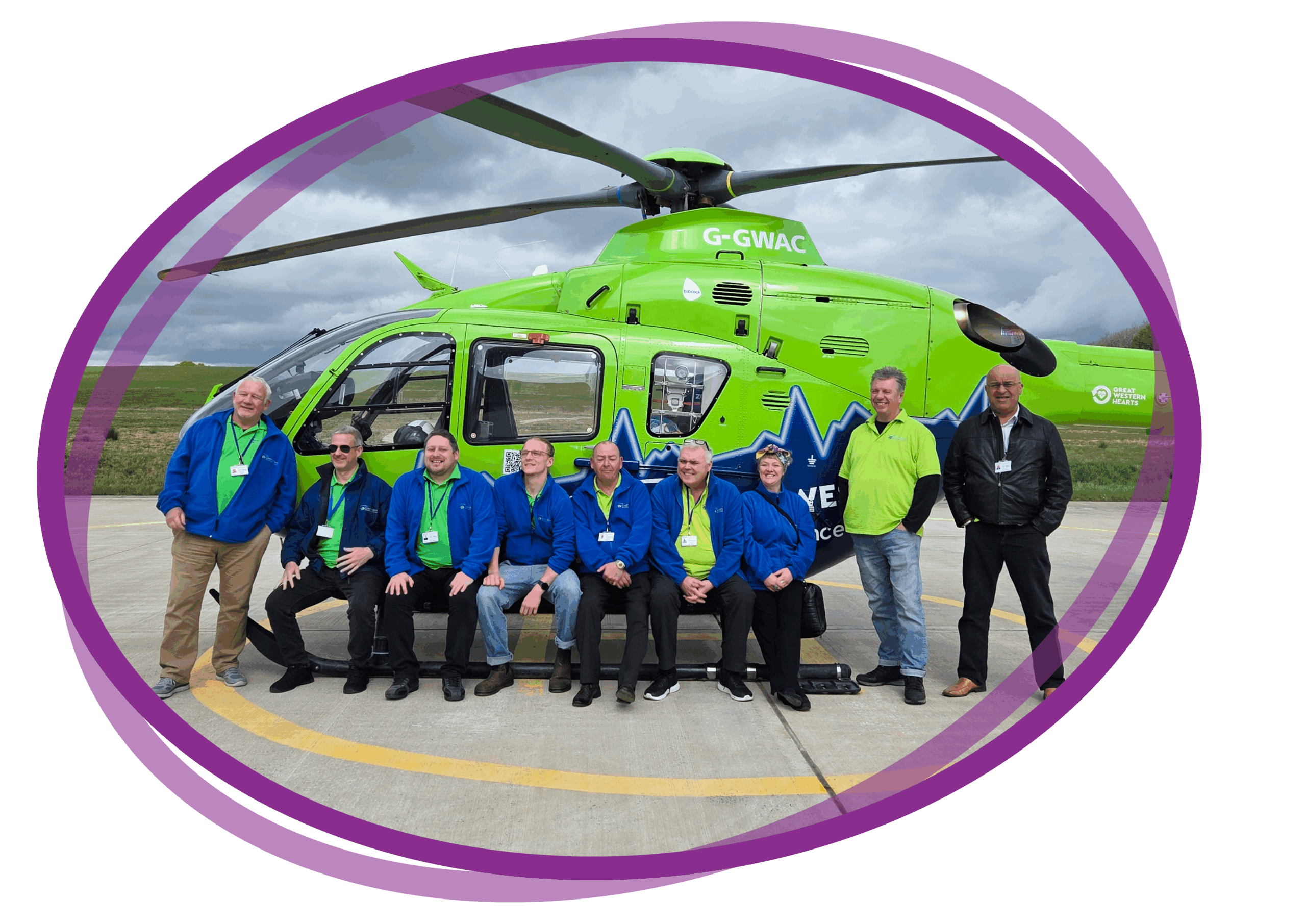lottery canvassers standing in front of a helicopter