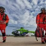 crew walking away from helicopter