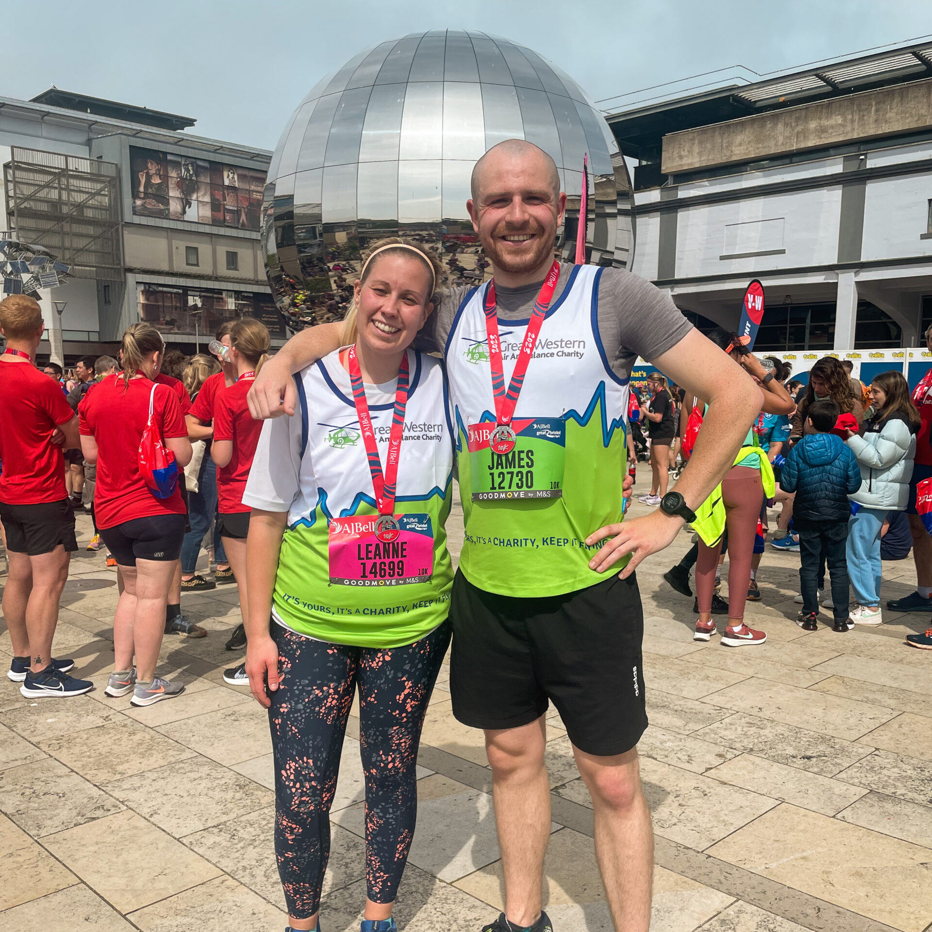 James Nash and Leanne with medals after completing the Great Bristol Run