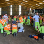 Kier employees doing CPR training with the Heartstarters volunteers